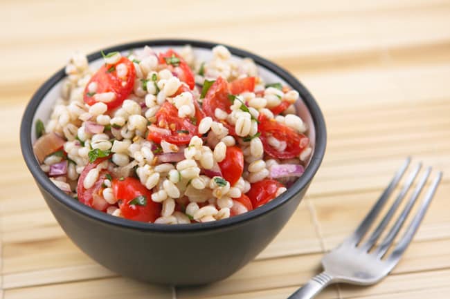 Bowl of tomato barley salad. 
