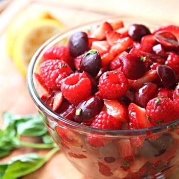 red fruit salad with raspberries, cherries and strawberries
