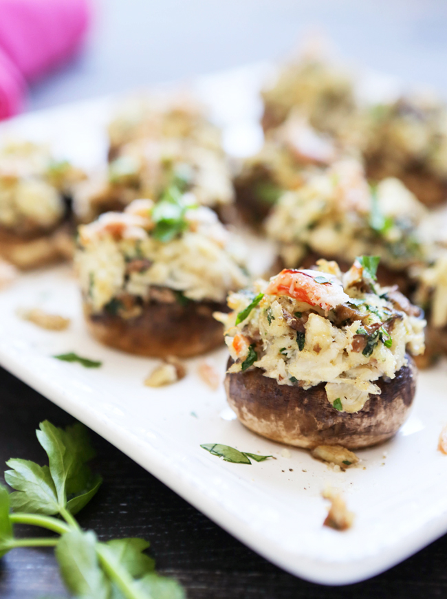 Crab stuffed mushrooms on a platter. 