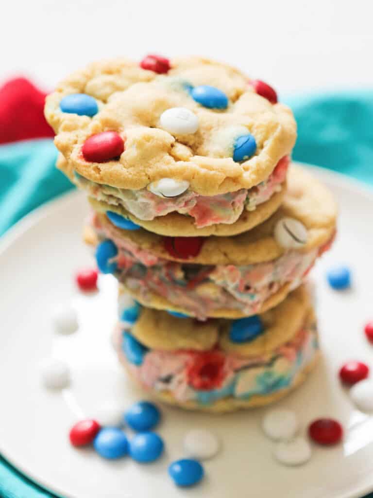 stack of ice cream sandwiches made with M&M cookies