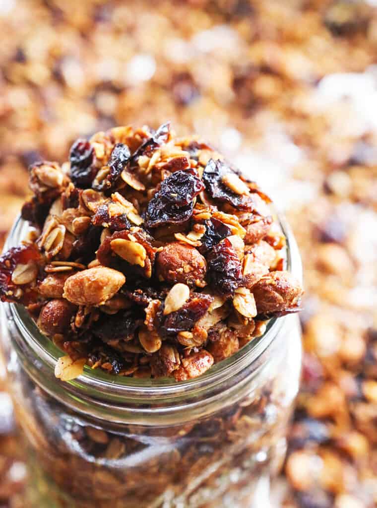 Nutty granola in a glass jar. 