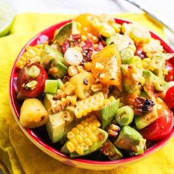 Grilled corn tomato salad in a bowl. 