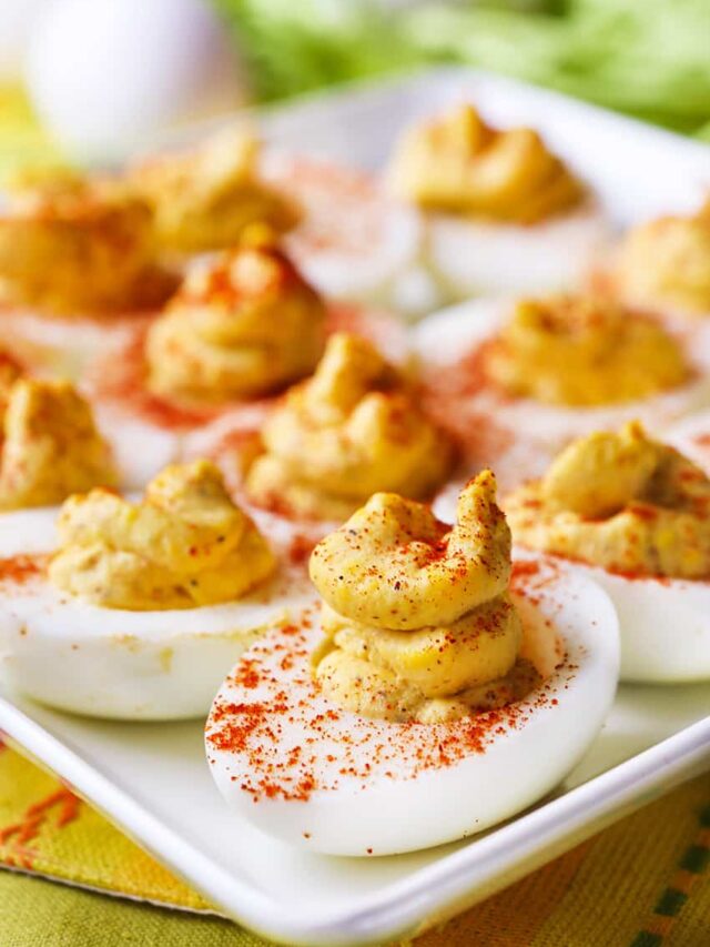 Deviled Eggs sitting on a platter. 