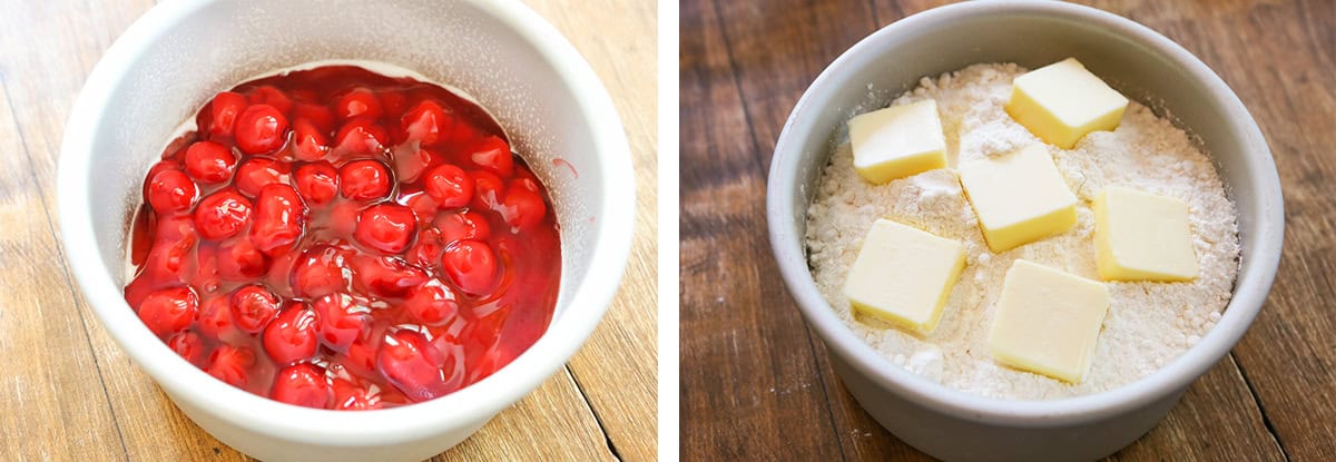 Fresh cherry pie filling with whole cherries in a white bowl on a wooden surface.