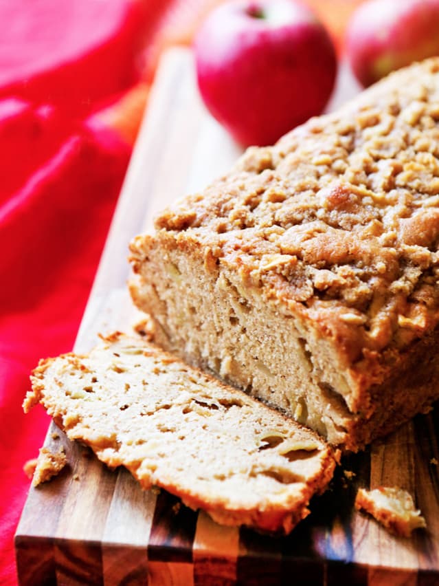 apple pie bread with a slice cut off the end