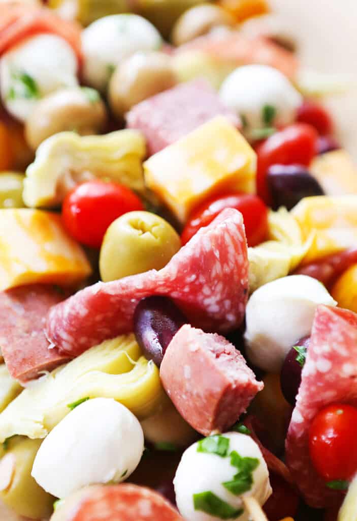 skewers with salami, olives, tomatoes and cheese