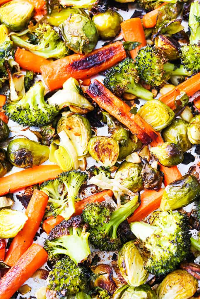 close up top view of sheet pan filled with roasted vegetables