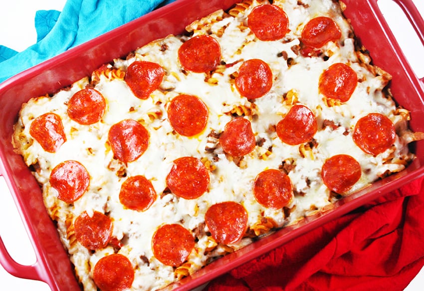 top view of baking dish filled with pizza pasta bake and pepperonis on top