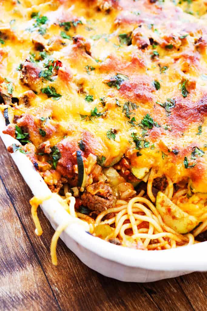 pan of baked spaghetti covered with a layer of cheese.