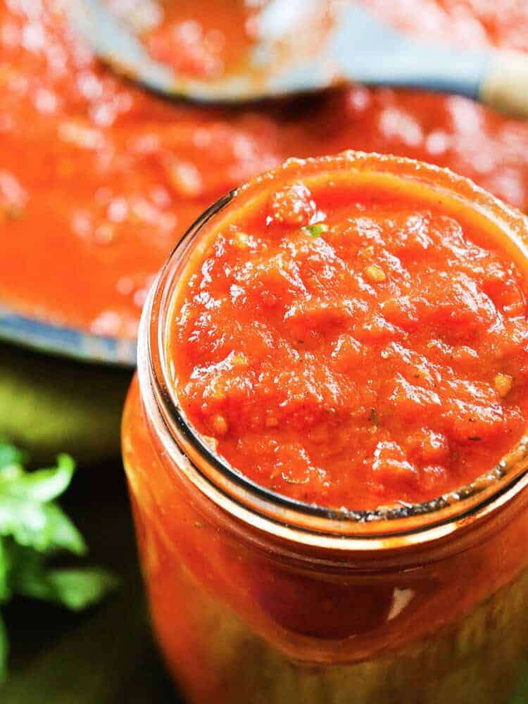 Mason jar filled with homemade marinara