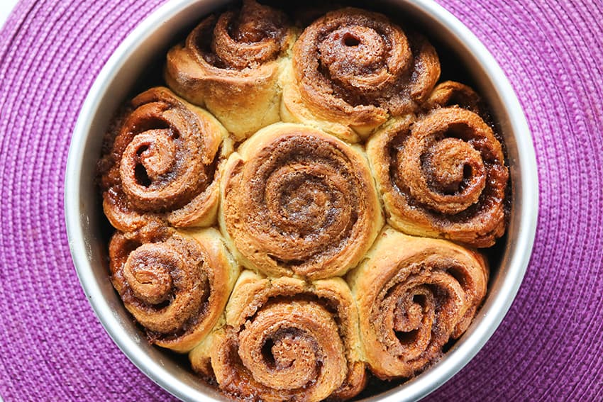 top view of cinnamon rolls in pan after baking