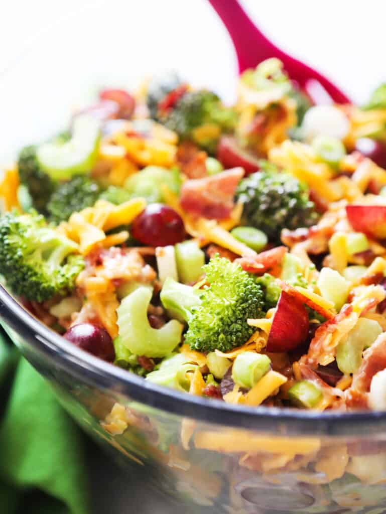 Glass bowl with broccoli salad. 