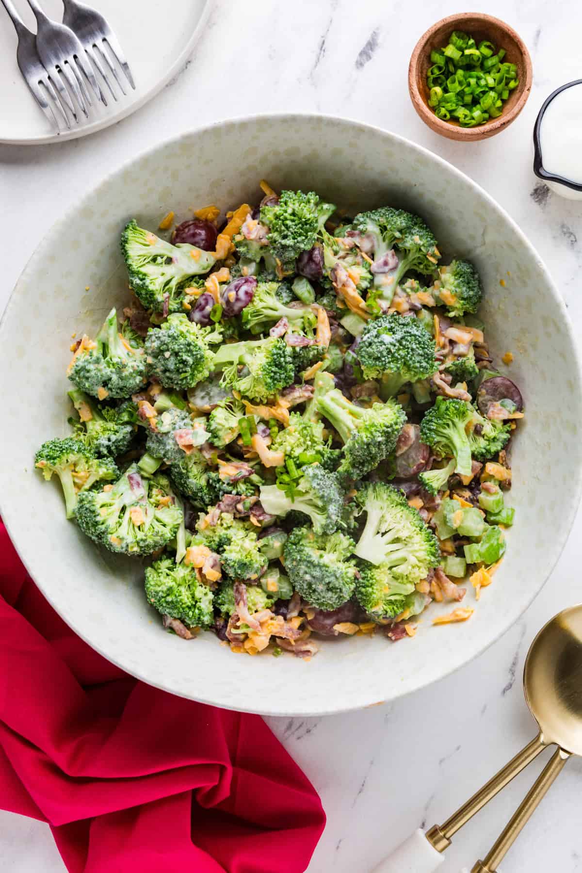 Top view of a serving bowl filled with broccoli salad.