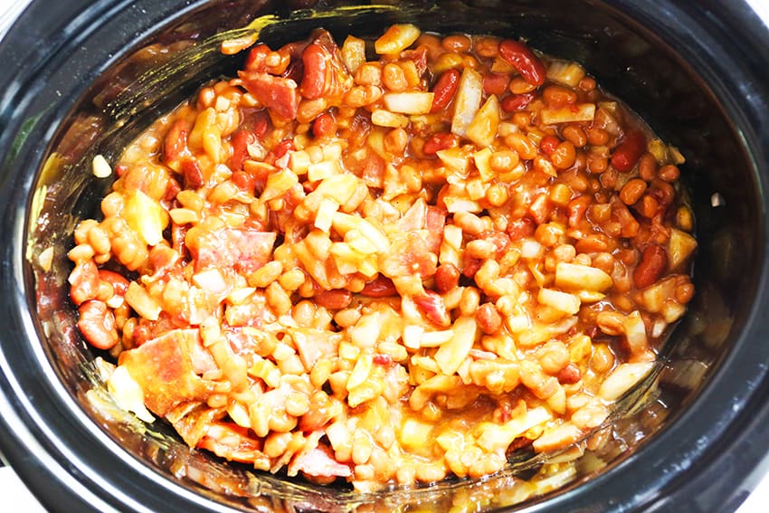 baked beans cooked and mixed together in a crockpot