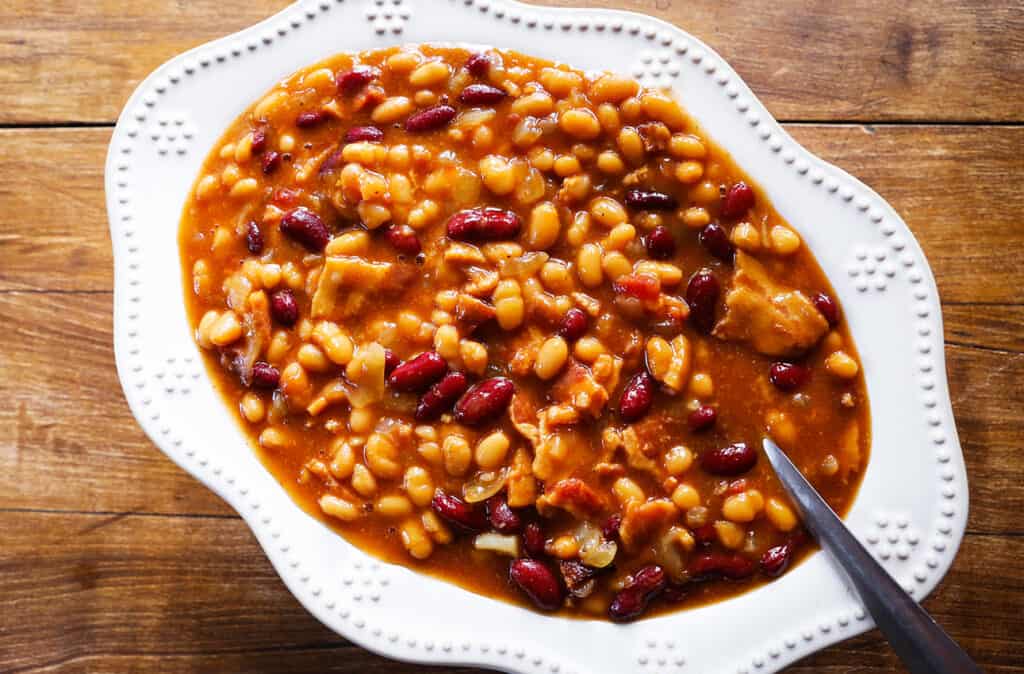serving bowl filled with baked beans