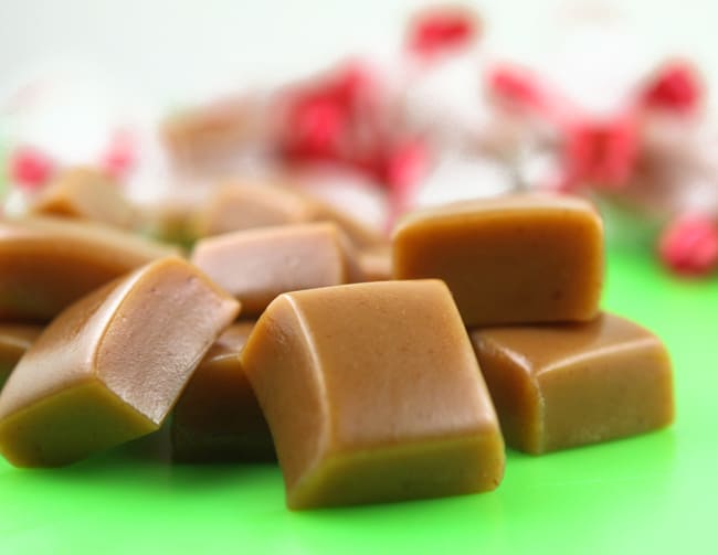 caramels stacked around each other on green placemat
