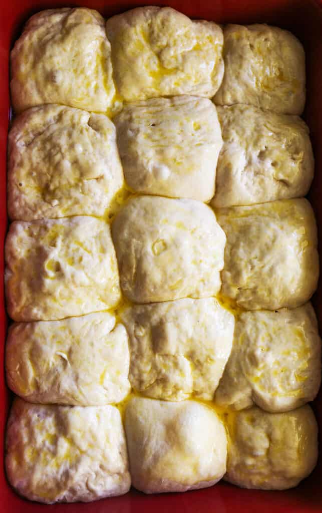 dough chunks in pan ready for baking