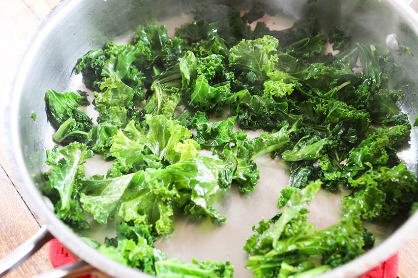 cooked kale in a skillet