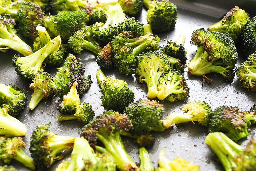 roasted broccoli on a baking sheet