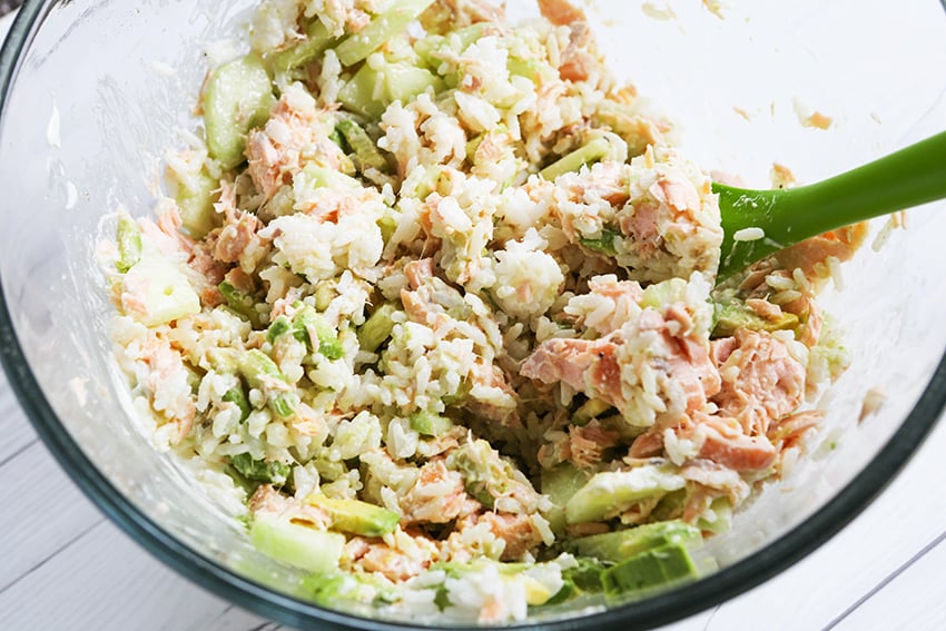 salmon, cucumber and rice mixture in a bowl
