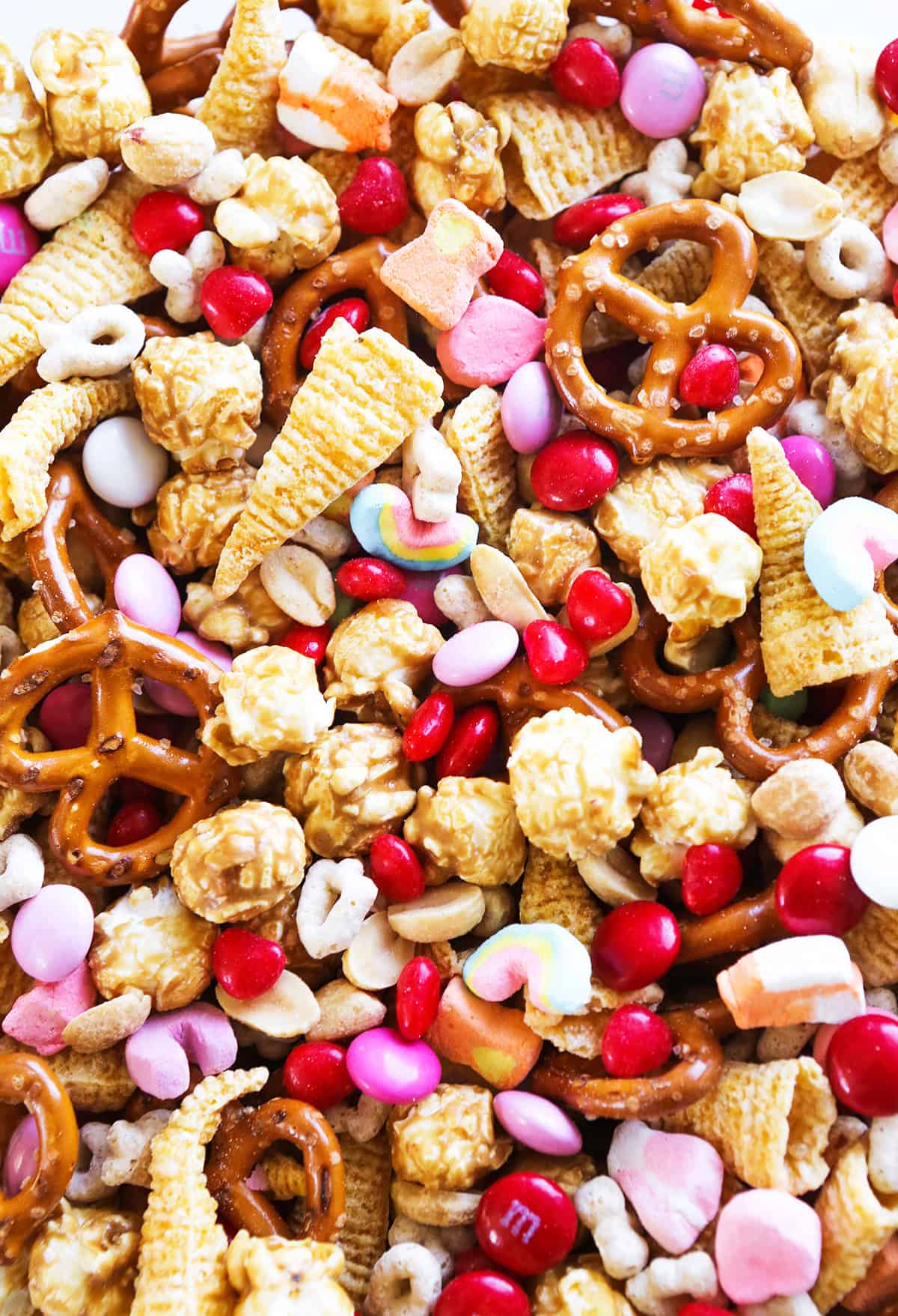 Close up image of the treats inside a valentine themed snack mix.