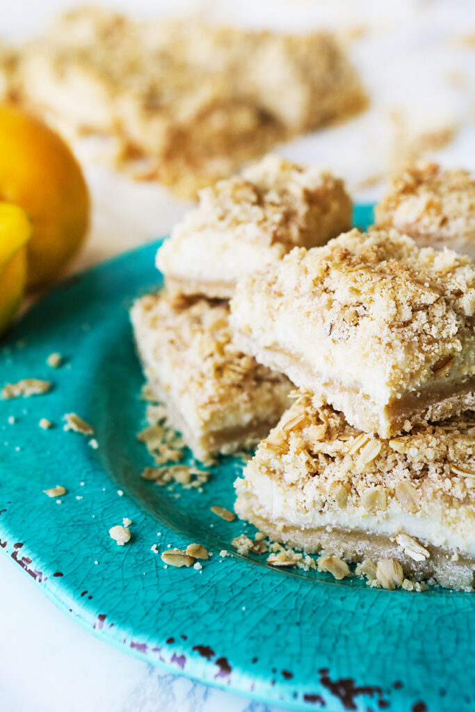 heaping plate of lemon bars with cream cheese