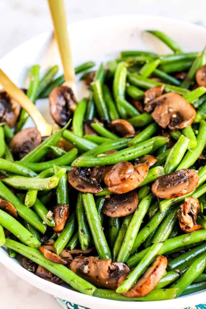 bowl of sauteed green beans with mushrooms