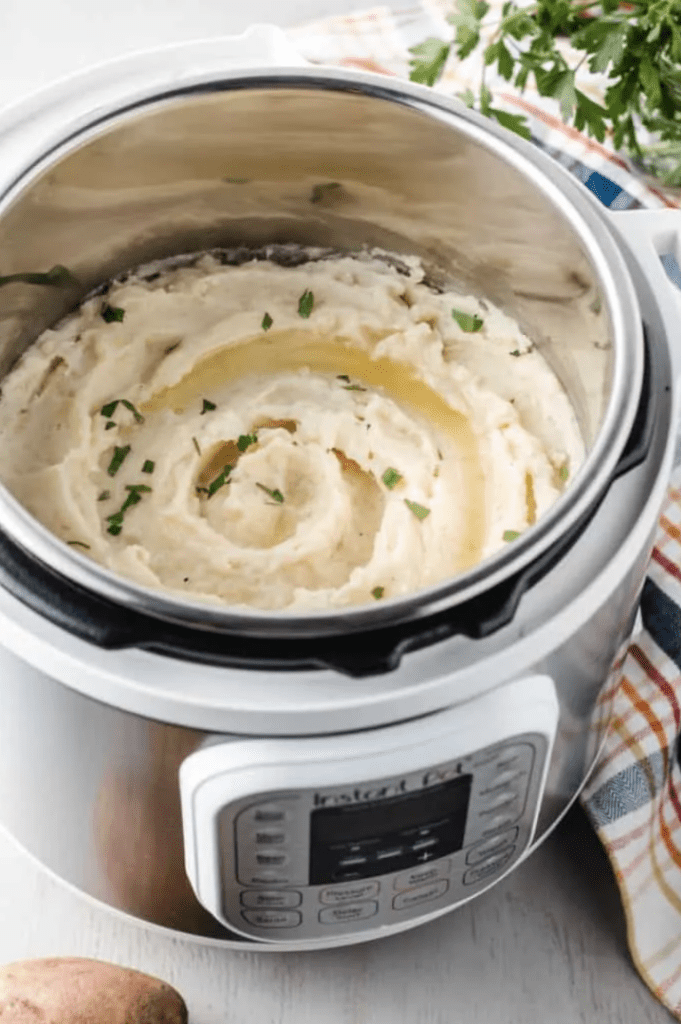 instant pot with prepared mash potatoes inside