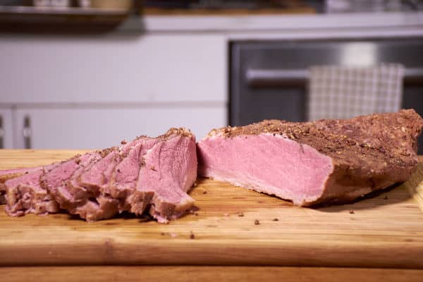 corn beef sliced on a cutting board