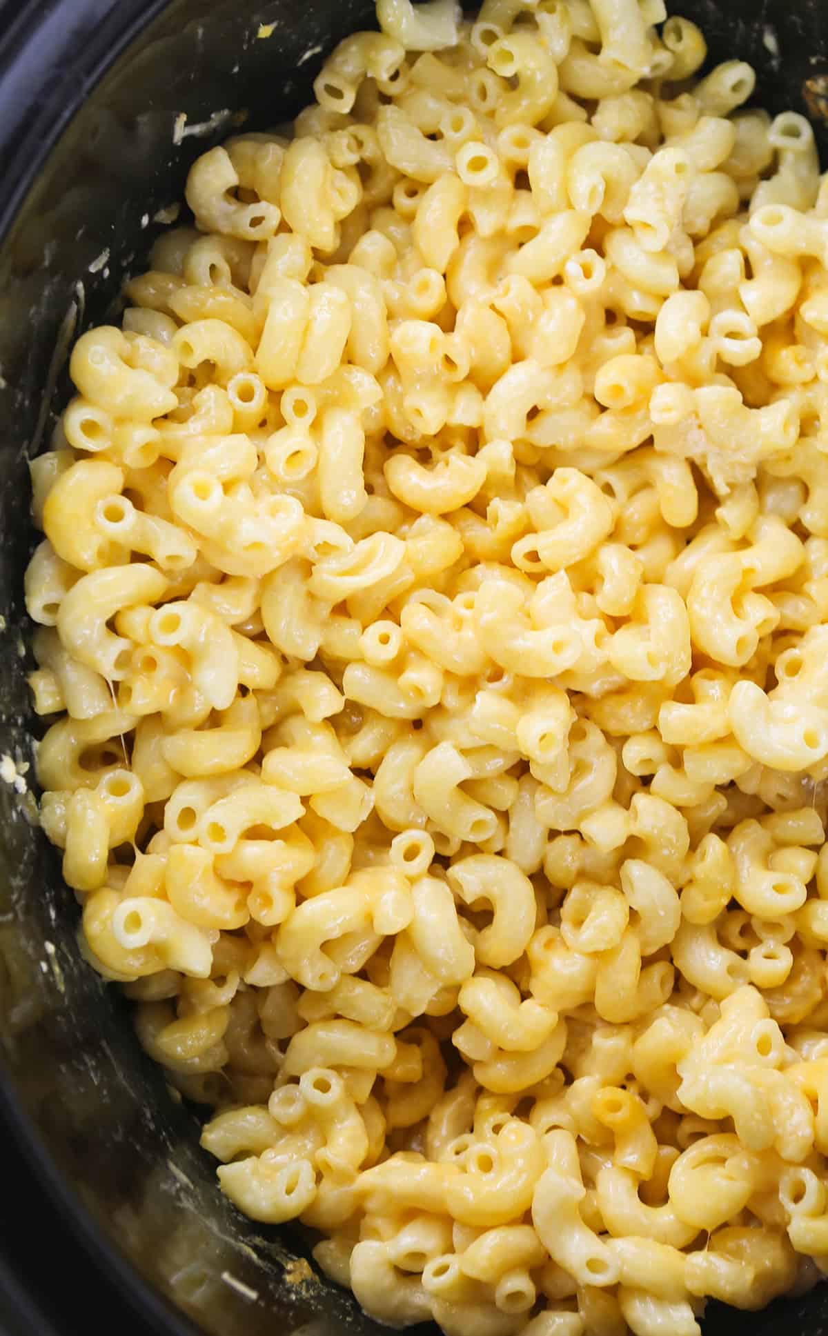 Perfectly cooked mac and cheese in a slow cooker.