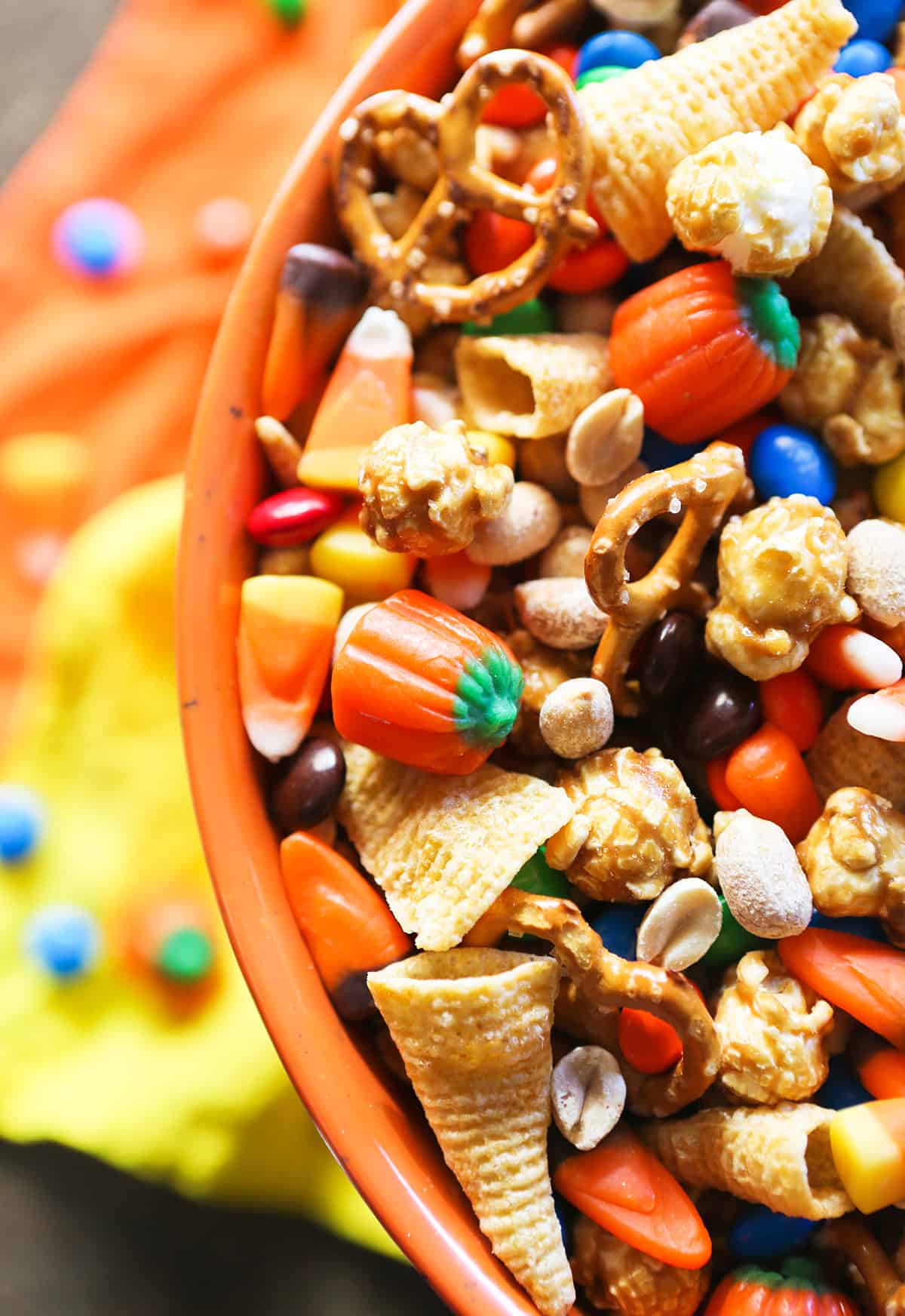 halloween snack mix in a bowl with bugles and candy corn. 