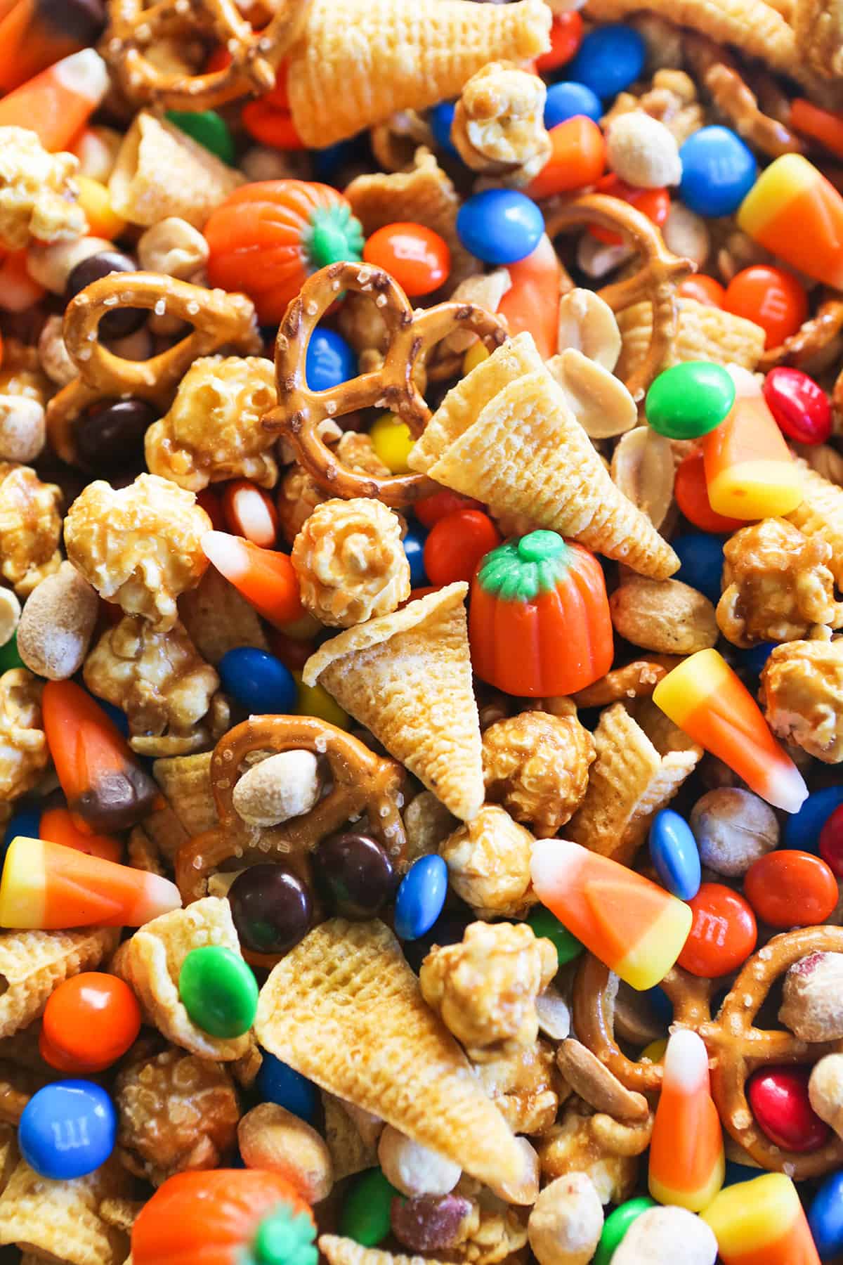 Snack mix with halloween themed ingredients.
