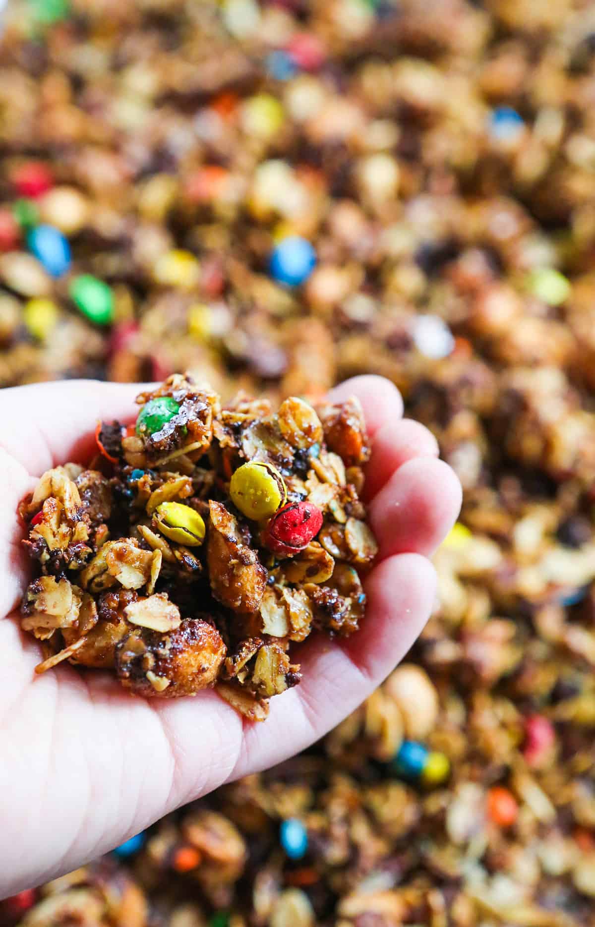 Hand filled with granola.