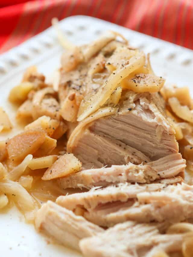 Platter of apple pork tenderloin shredded up and ready to serve. 