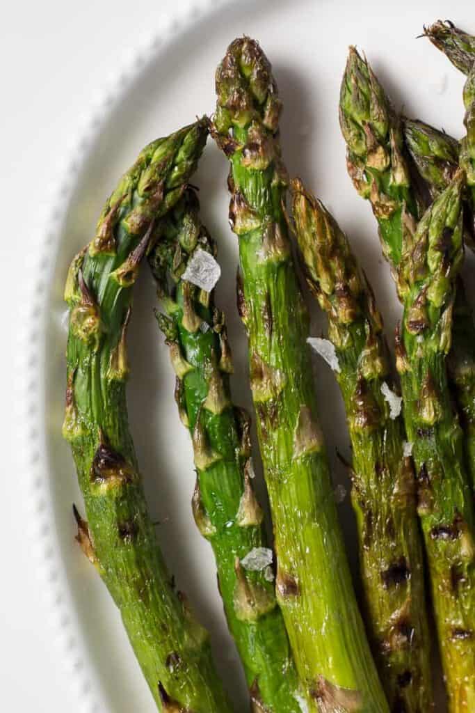 Platter of grilled asparagus ready to serve. 