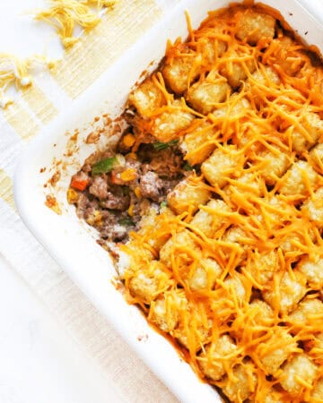 Cheesy Tater Tot Casserole with melted cheese and flavorful ingredients.