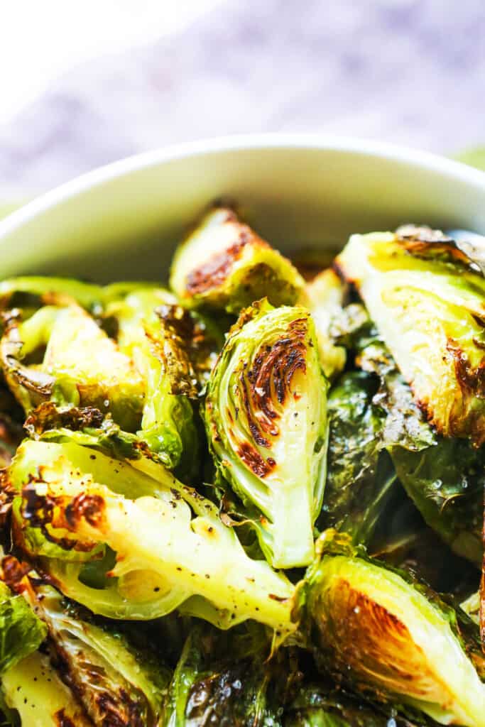 Bowl of oven roasted Brussels sprouts. 