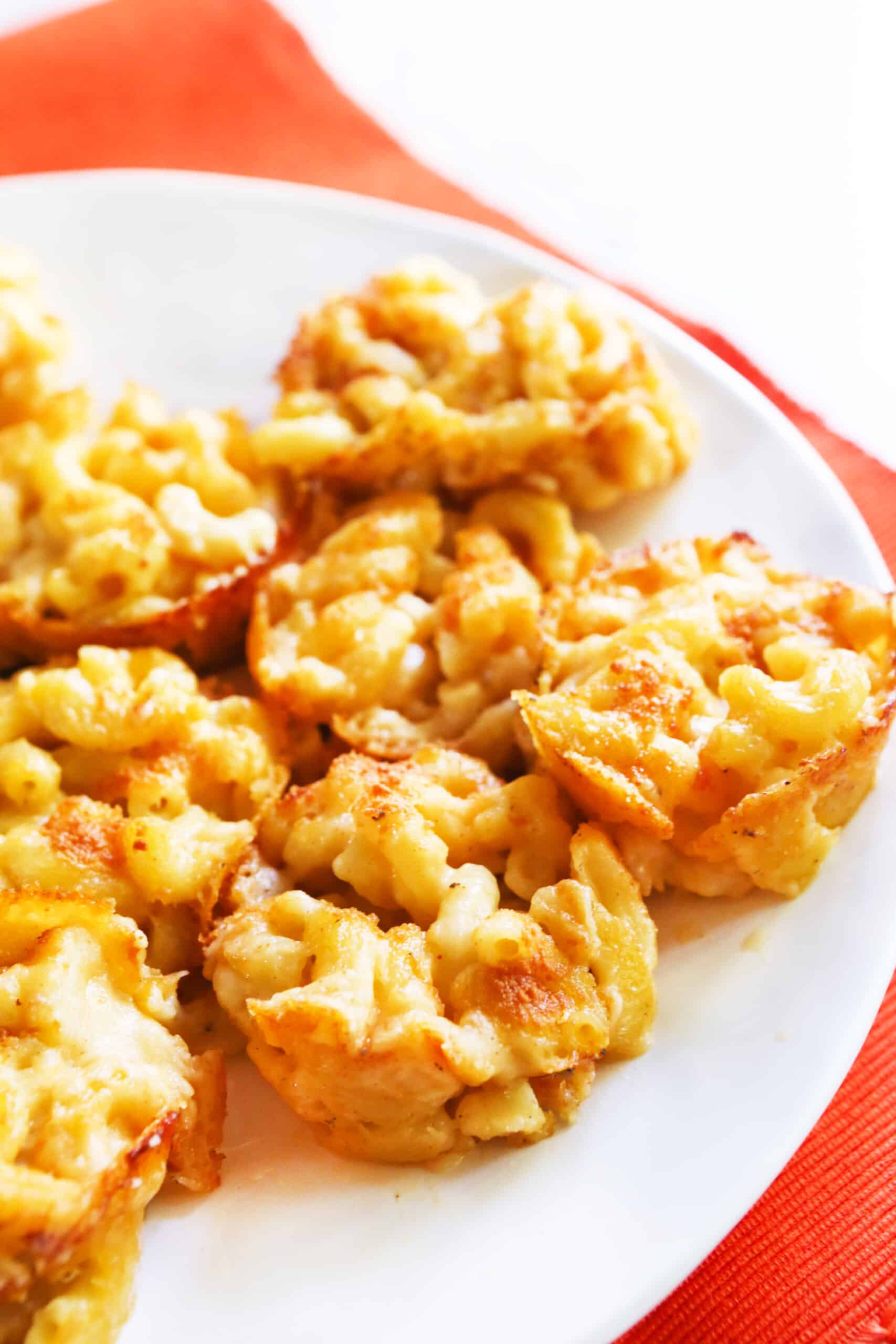 Baked mac and cheese bites in a bowl. 