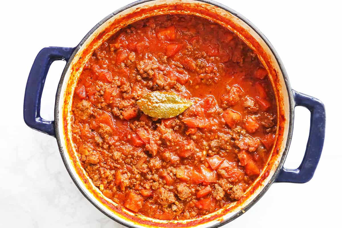 Thick, meaty spaghetti sauce in a Dutch oven.