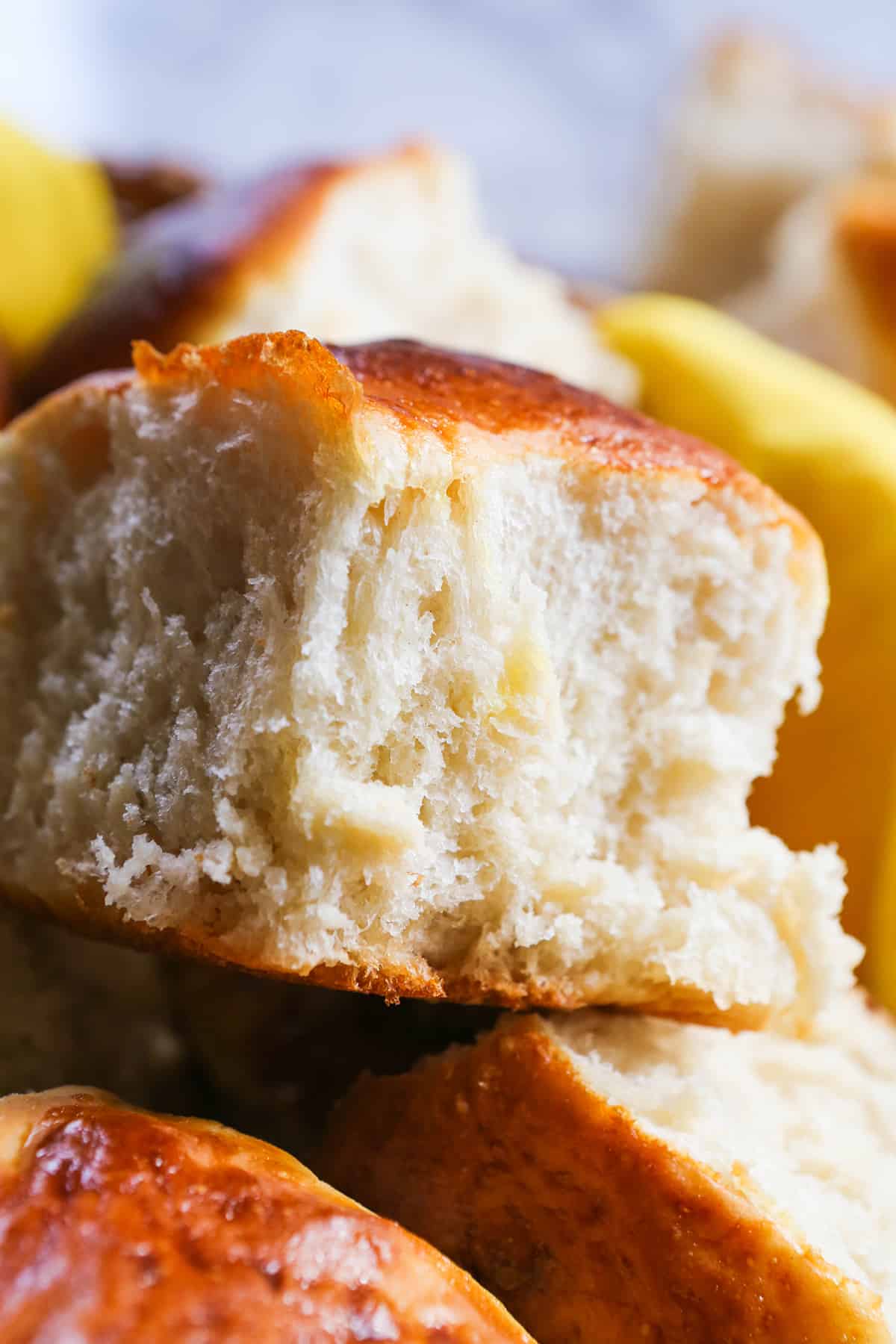 Close up of a fluffy, perfect baked dinner roll.