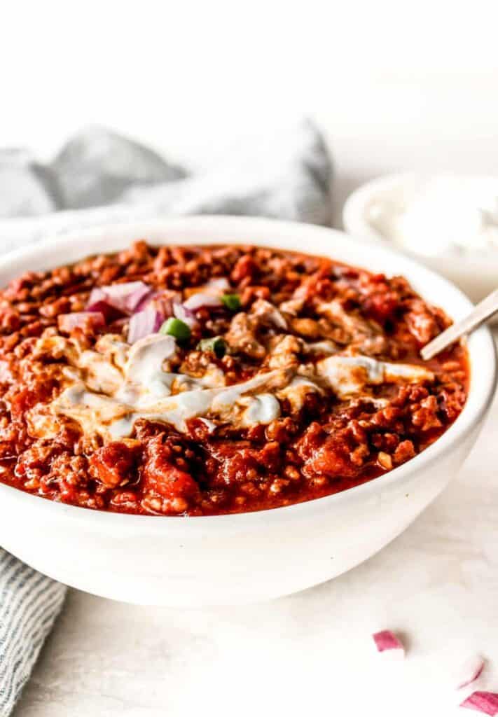 Spoon tucked into a bowl of no bean chili. 