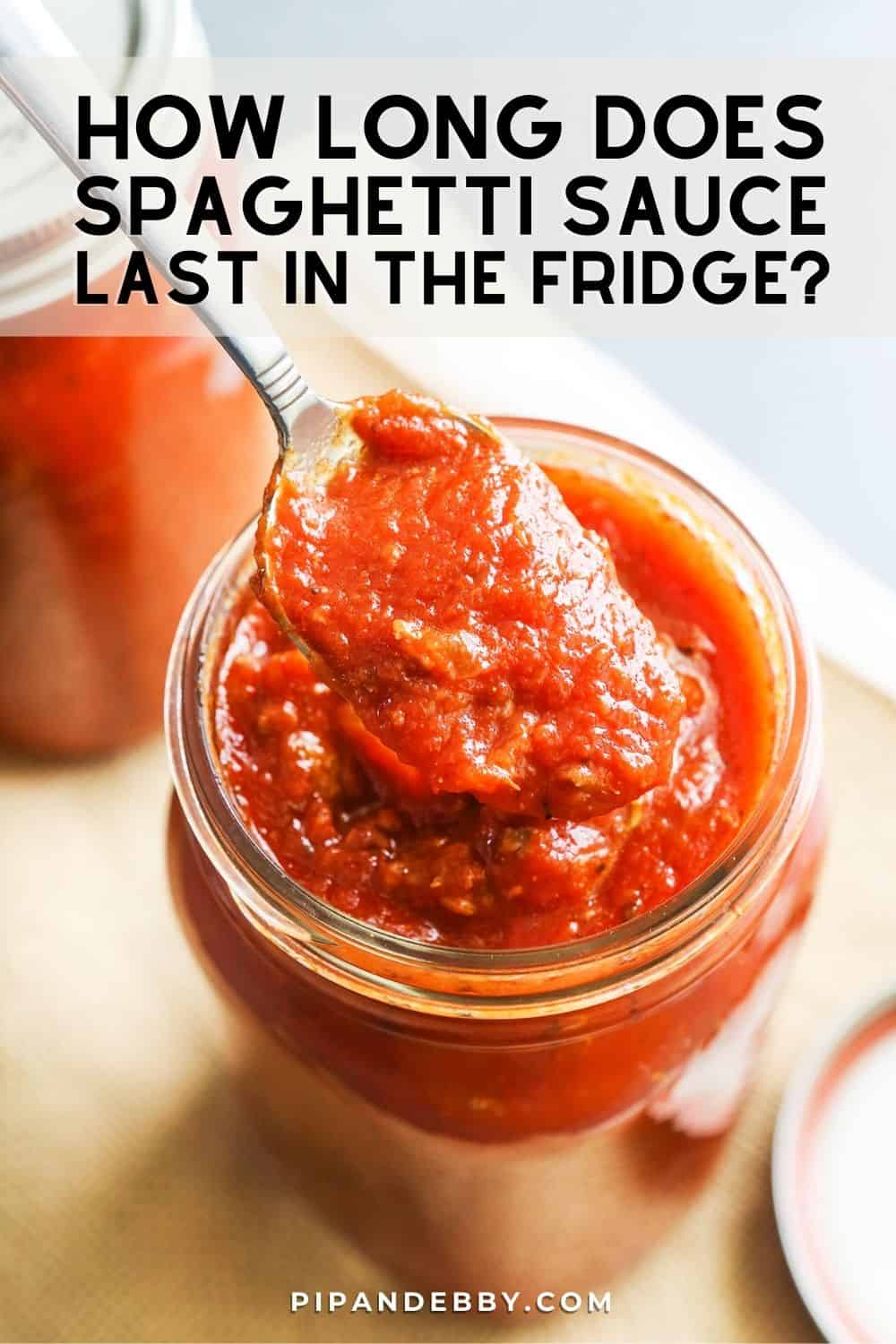 Spoon lifting sauce out of a mason jar with text overlay reading, "How long does spaghetti sauce last in the fridge?"