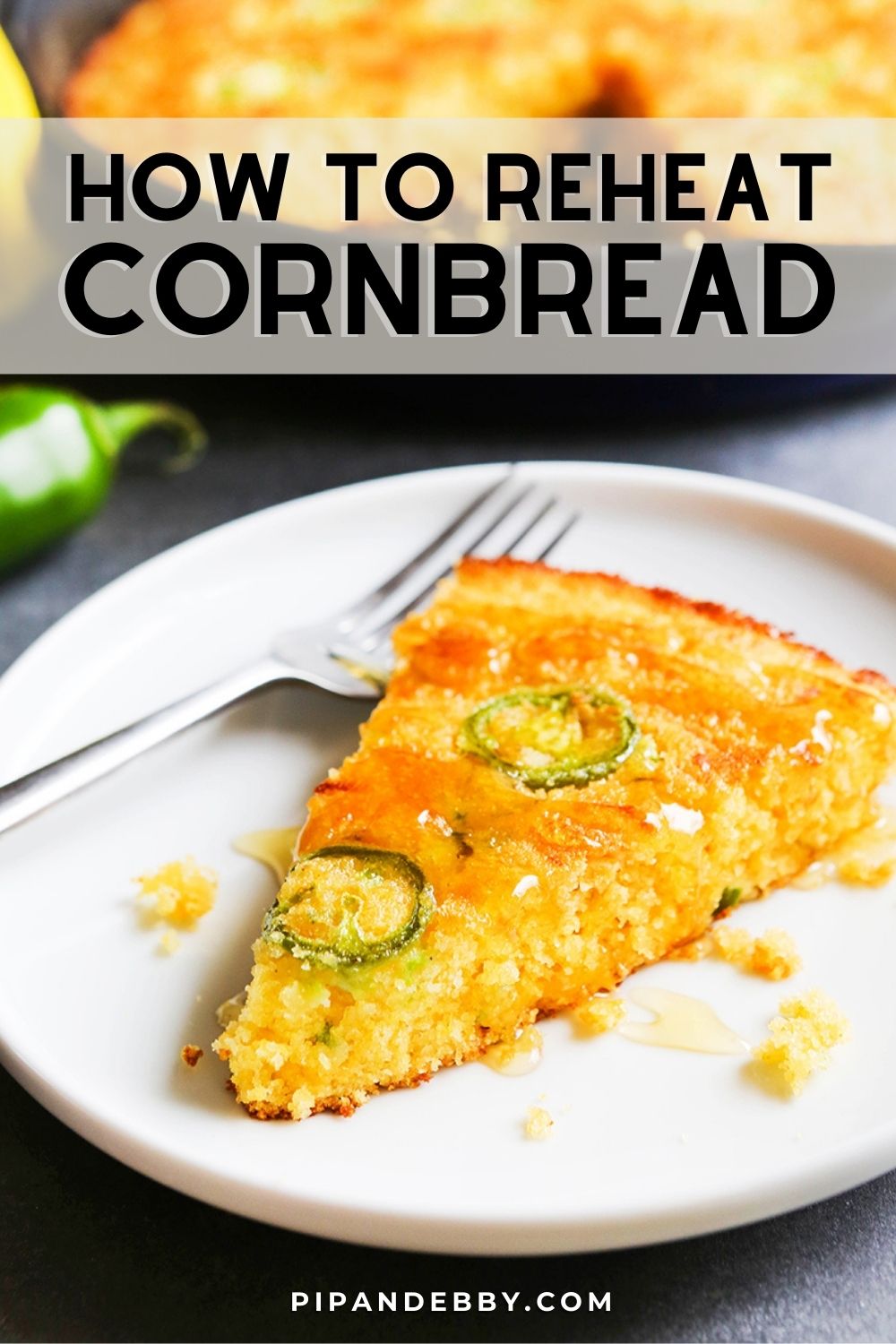 Photo of a piece of cornbread with text overlay reading, "How to reheat cornbread."