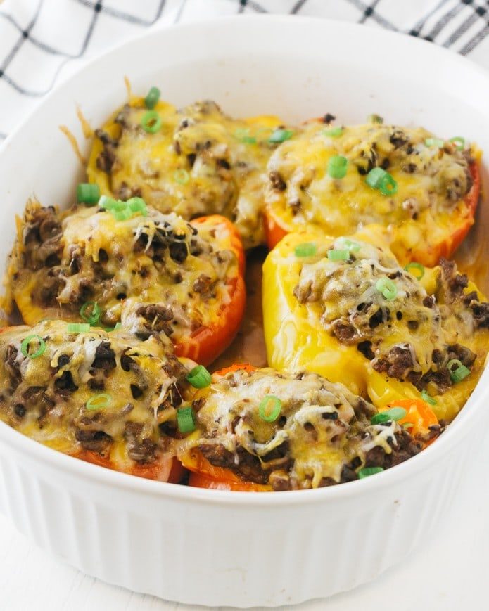 Keto stuffed peppers in a baking dish. 