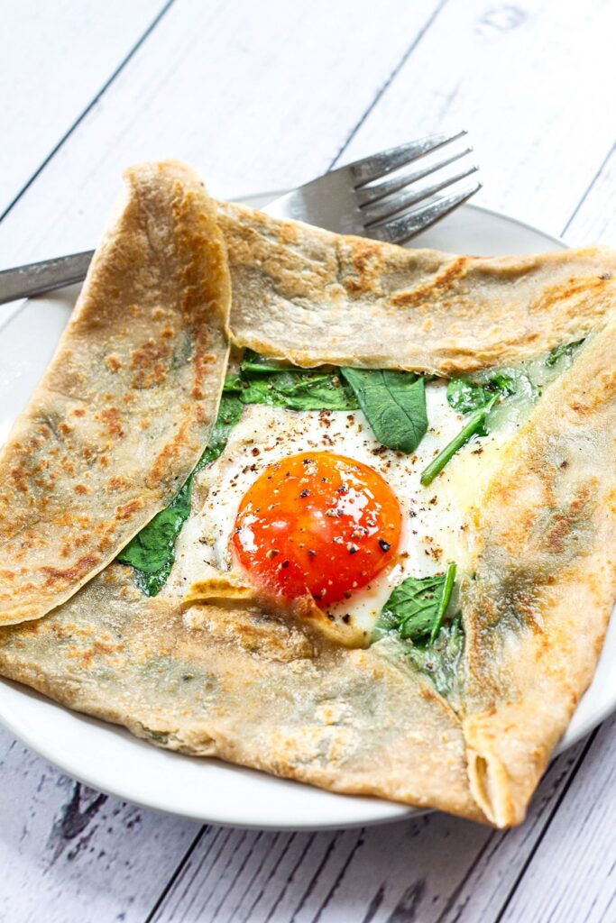 Buckwheat galette with spinach and fried egg. 