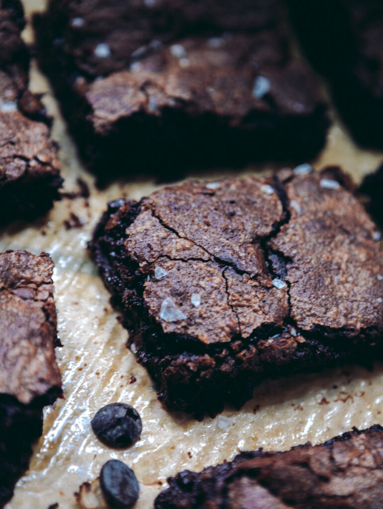 Mexican hot fudge chocolate brownies on a baking sheet cut into squares. 