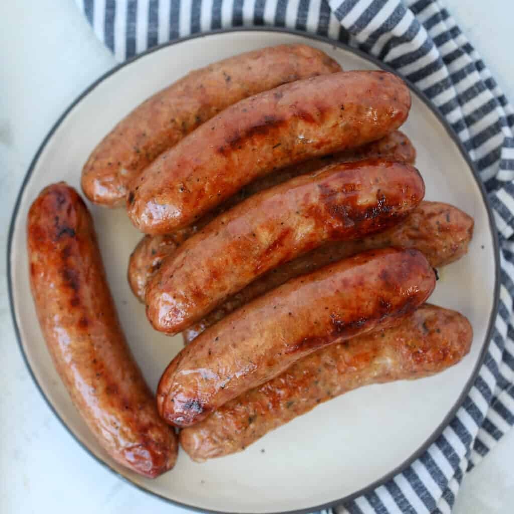 Plate of chicken sausages that had been prepared in the air fryer. 