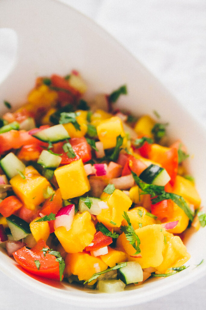 Cucumber mango salsa in a bowl.