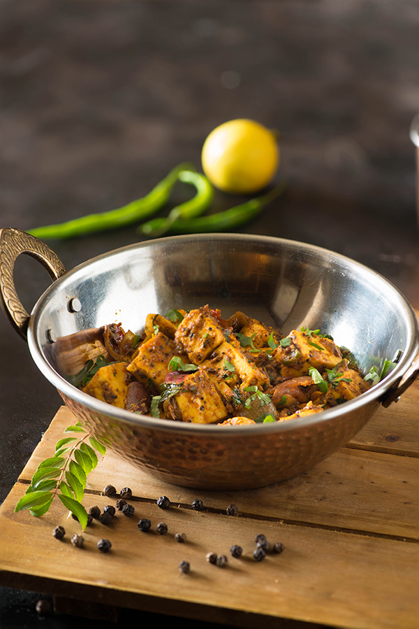 Serving bowl with Paneer Kali mirch ready to serve. 