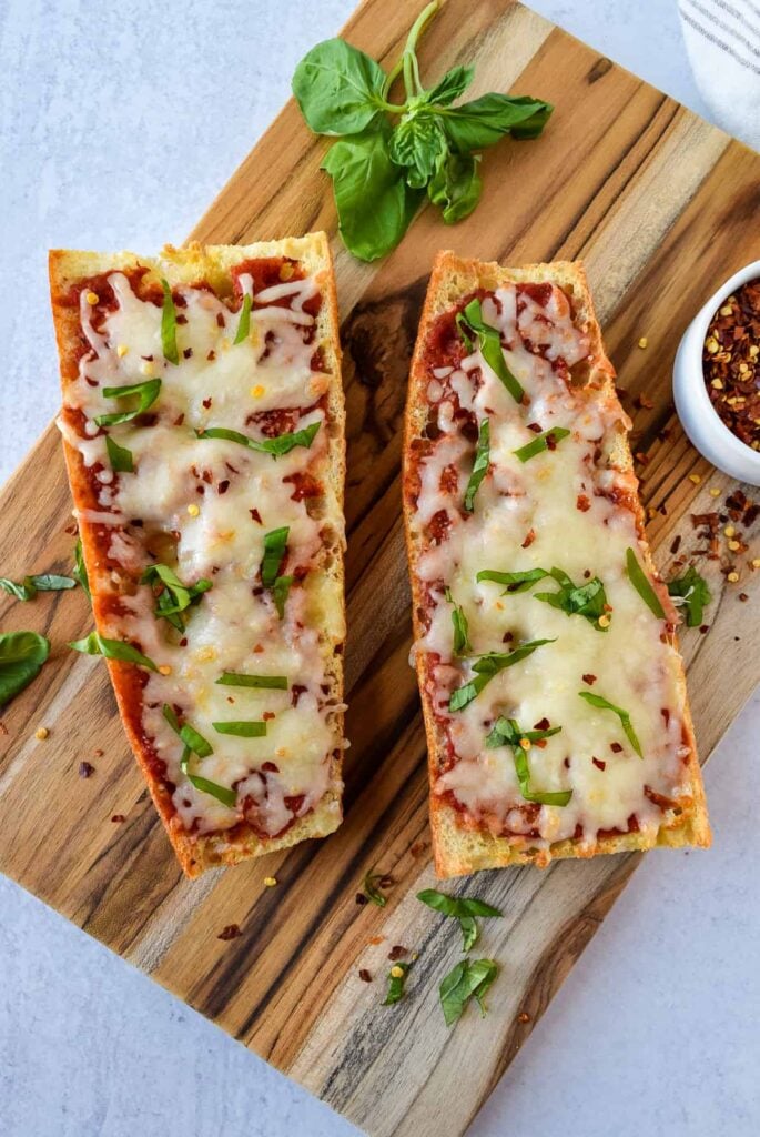 Two pieces of french bread pizza made in an air fryer. 